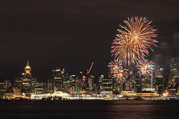 Naklejka premium Downtown Vancouver with Canada Day fireworks