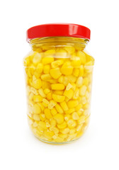 Sweet corn in glass jar isolated on white