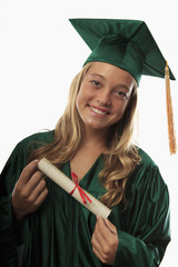 female graduate in cap and gown with diploma.