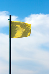 Yellow flag in the sky