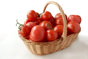 red tomatoes in basket