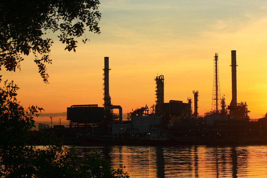 Oil refinery with sunrise, Thailand