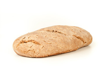 long loaf of hot whole rye kosher bread isolated on white