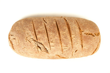long loaf of hot whole rye kosher bread isolated on white