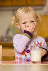 little girl drinking milk