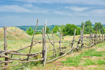 Fototapeta na wymiar A country fence for cattle.