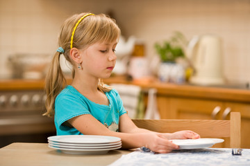 girl covering the table