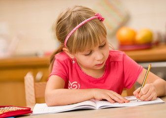 girl doing homework © mbt_studio