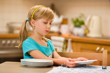 girl covering the table