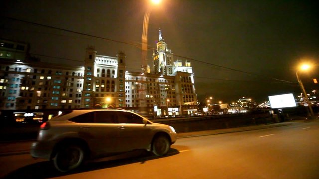 Jeep passing in front of Kotelnicheskaya Embankment Building