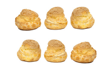 Baked cream puffs filled with custard with white backgrounds