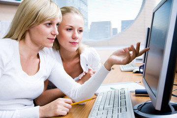 Portrait  two working  businesswomans