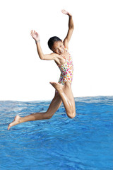 Girl jumping in  swimming pool