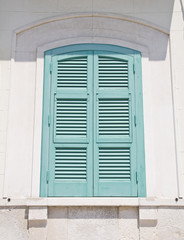 Wooden green shutter.