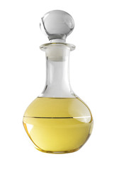 Yellow liquid in glass decanter | Isolated