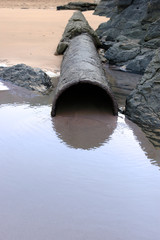 sea water rusty overflow pipe