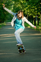 Teenage girl with skateboard