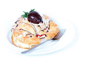Cream filled croissant with chocolate strawberry