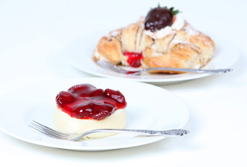 Strawberry cheesecake and creme filled croissant with chocolate