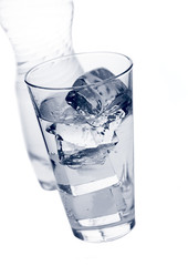 glass with ice and purified mineral water