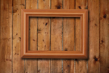 Obraz na płótnie Canvas frame on wooden wall