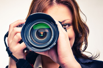 young girl with photocamera