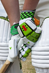 Cricket batsman at the crease of a wicket