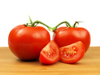 Tomatos on white background