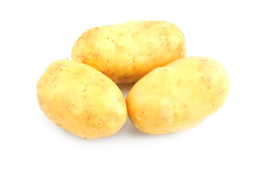 Three raw potatoes isolated on white background