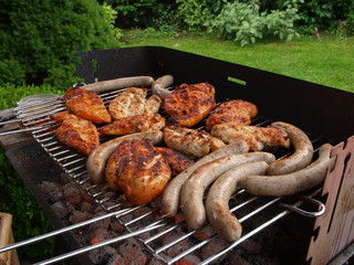 Meat cooking on barbecue