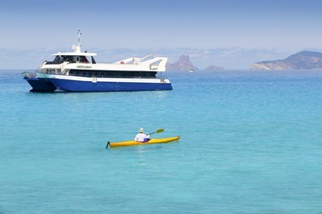 Naklejka premium Illetas turquoise sea kayak Formentera boat