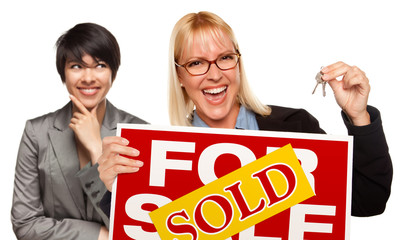 Female with Blonde Woman Holding Keys and Sold For Sale Sign