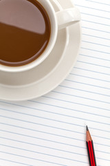 Coffee cup and notes