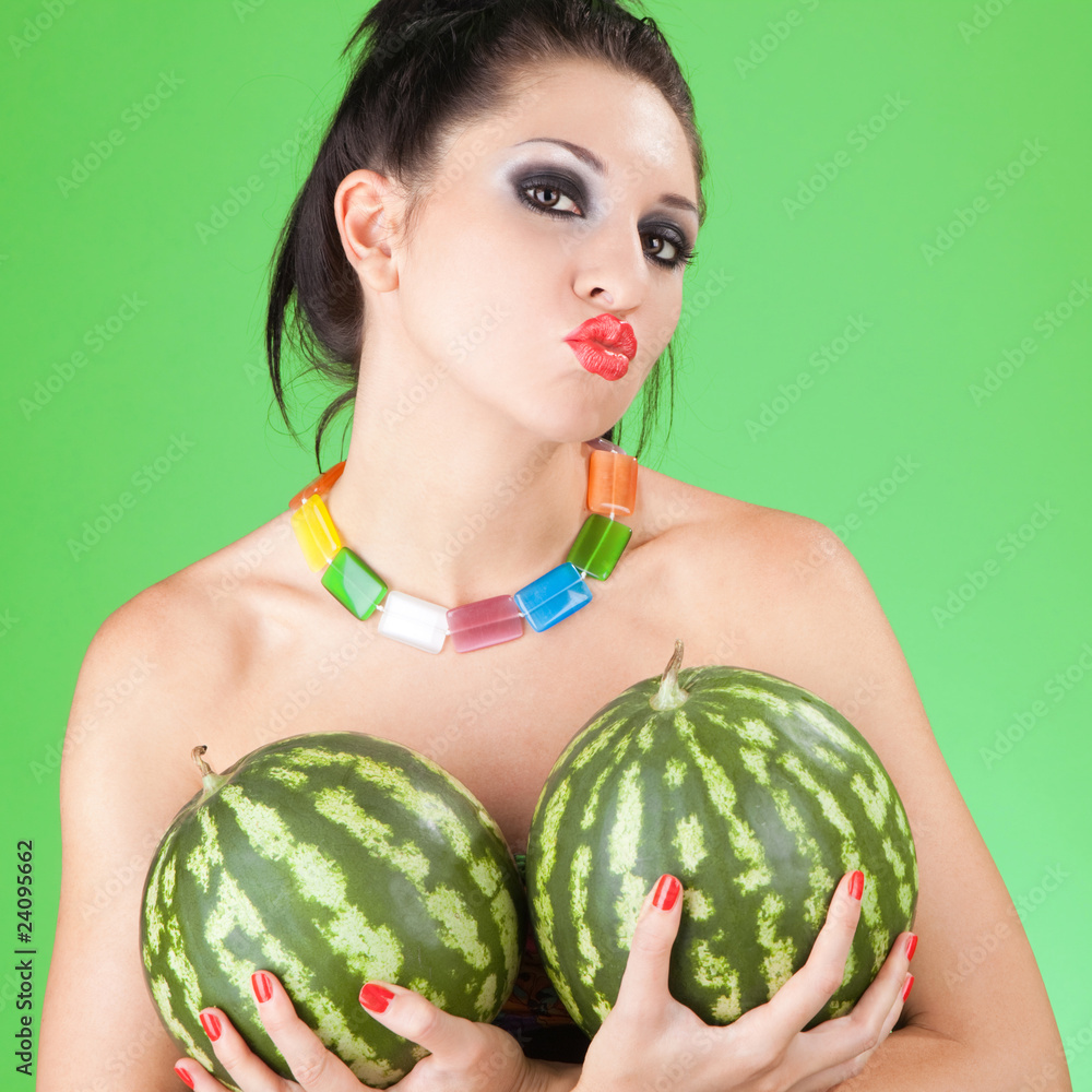 Poster fun woman with watermelons on the green background