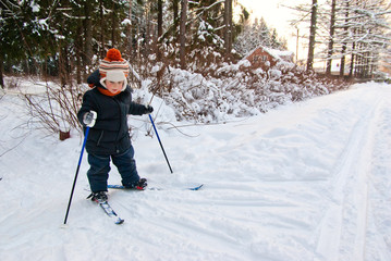 Fototapeta na wymiar Little Boy Cross Country Skiing