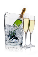 Champagne in a ice bucket and two champagne flutes