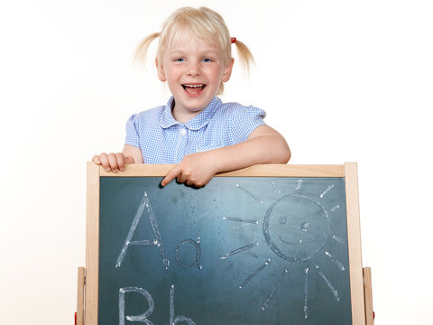 Little girl has fun to learn the ABC