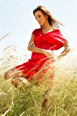 Obraz premium Young Attractive Beautiful Woman Enjoying the sun