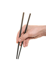 hand with a chopsticks isolated over white