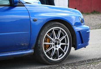 Fototapeta na wymiar Blue sport car detail