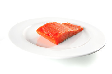 fresh smoked salmon on white plate