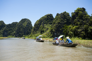 Sampan rowing in Tam Coc Vietnam