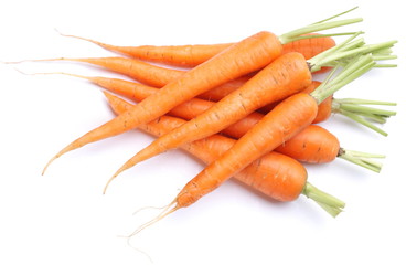 Ripe fresh carrots on a white background.
