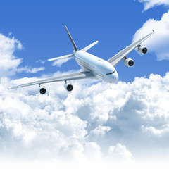 Fototapeta na wymiar Samolot lecący nad przednim widok z góry chmury
