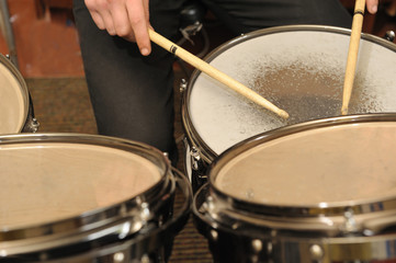 Fototapeta na wymiar The drummer in action