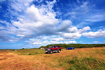 Fototapeta premium A red car on summer day