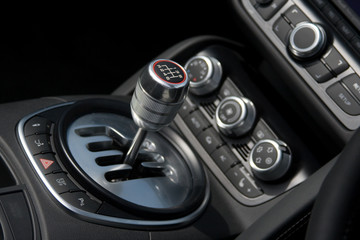chrome 6-speed gear shift in luxury car