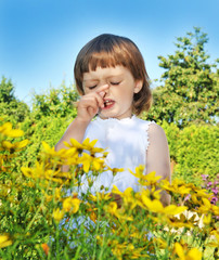 sneezing little girl - pollen fever allergy