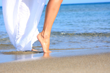 Beautiful woman by the sea