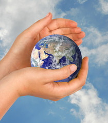 Hand with planet earth